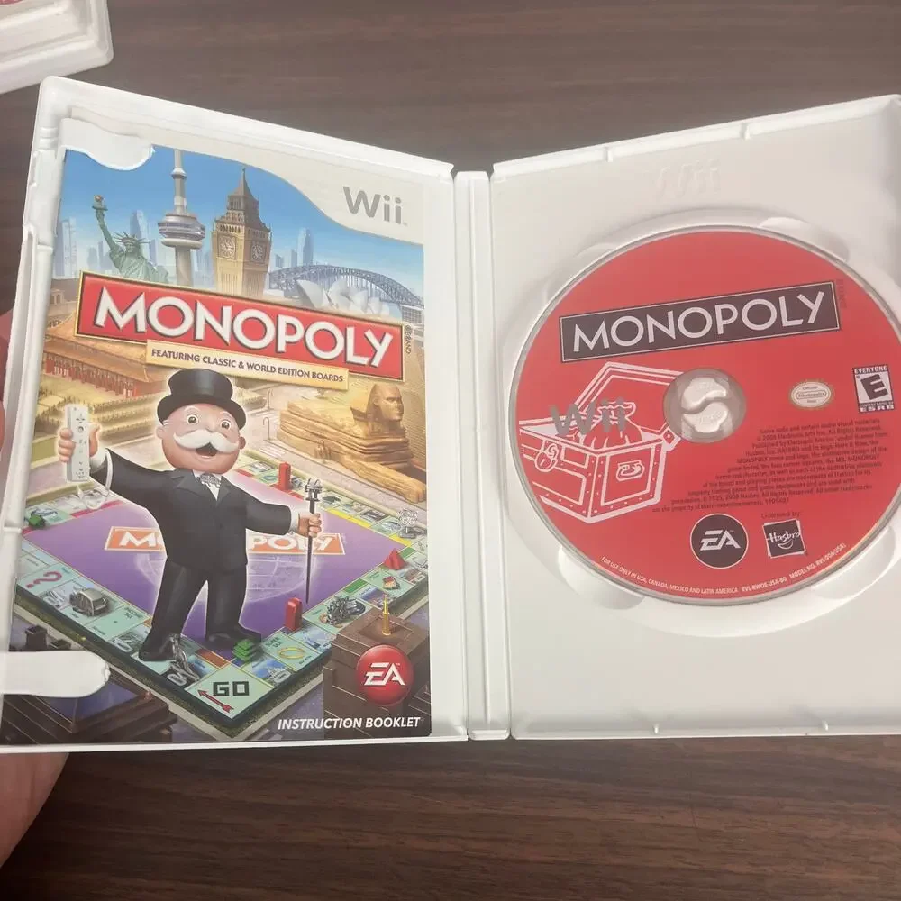 Wii Lot of 4 Video Games Monopoly Backyard Football Pictionary Toy Story CIB